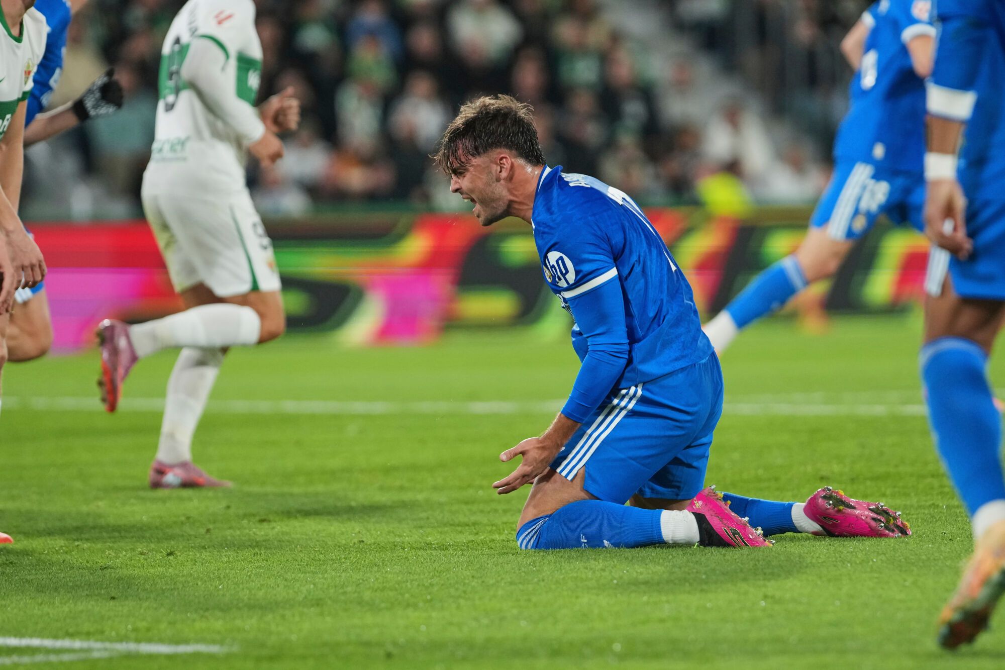 Real Madrid's Raul Asencio reats during the Spanish La Liga soccer match between Elche and Real Madrid in Elche, Spain, Sunday, Nov. 23, 2025. (AP Photo/Alberto Saiz)