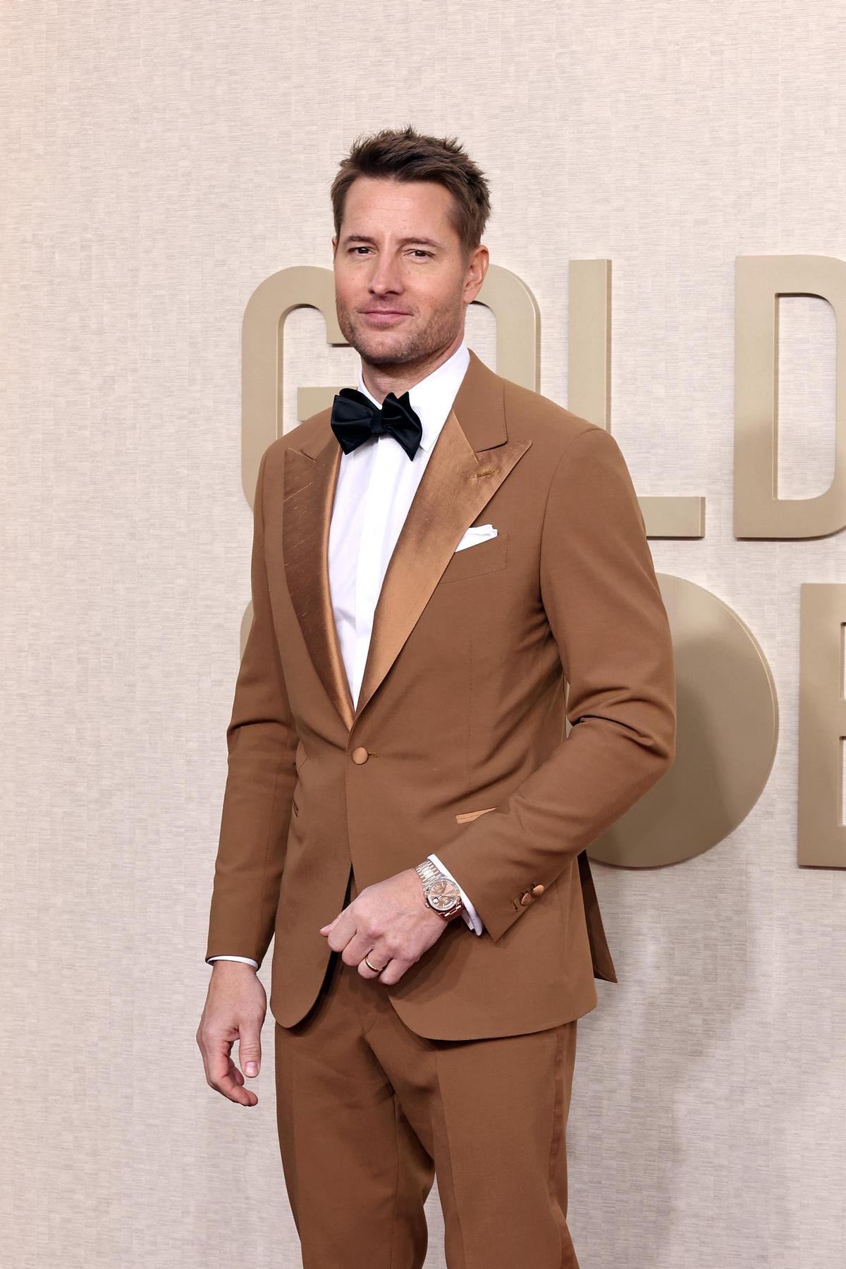 Justin Hartley en la alfombra roja de los Globos de Oro