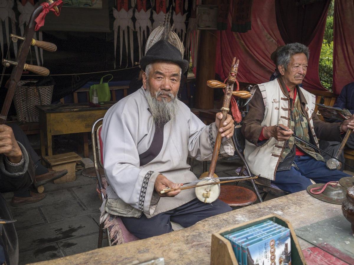 Músicos callejeros naxi