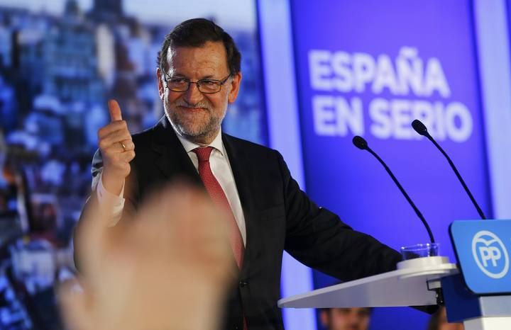 Spanish Prime Minister and People's Party (PP) leader Mariano Rajoy gestures during a campaign rally ahead of Spain's general election in Valencia