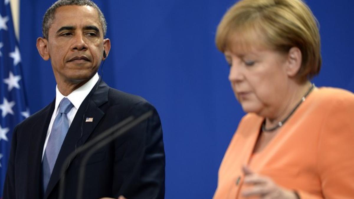 Obama y Merkel, durante la rueda de prensa.