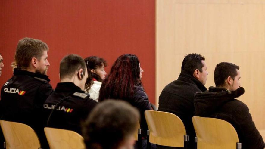 Cuatro de los acusados, ayer, en la Audiencia Provincial.