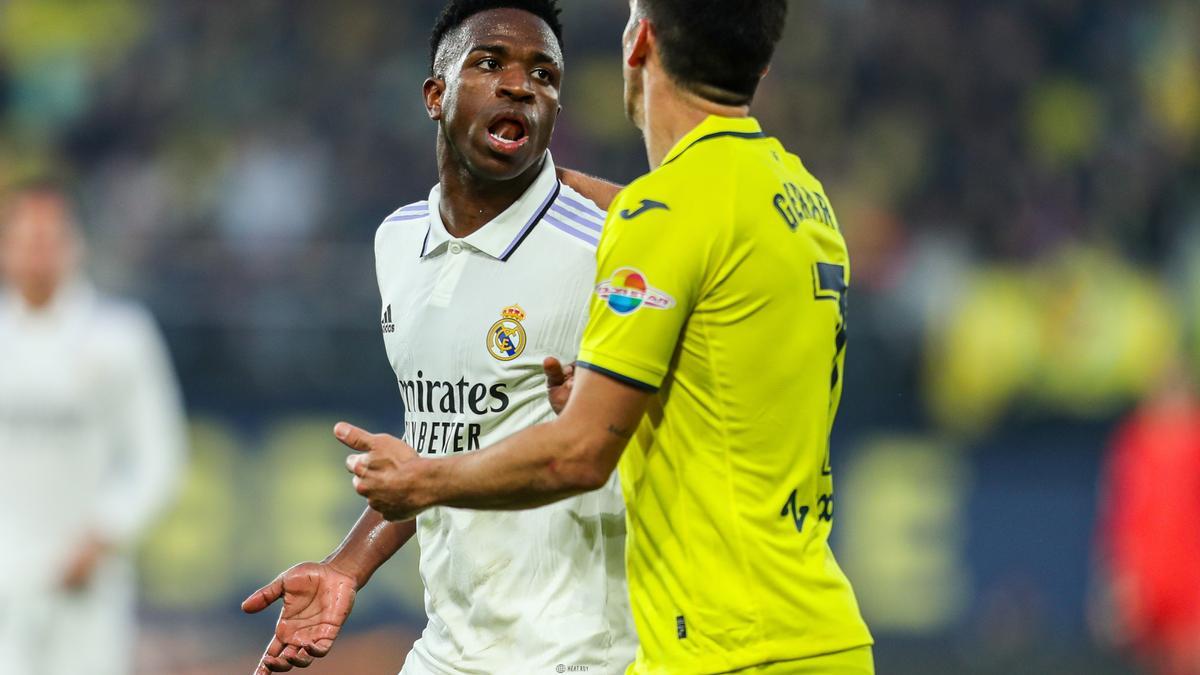 Vinicius Junior of Real Madrid protests to Gerard Moreno of Villarreal during the Santander League match between Villareal CF and Real Madrid at the La Ceramica Stadium on January 7, 2023, in Castellon, Spain.