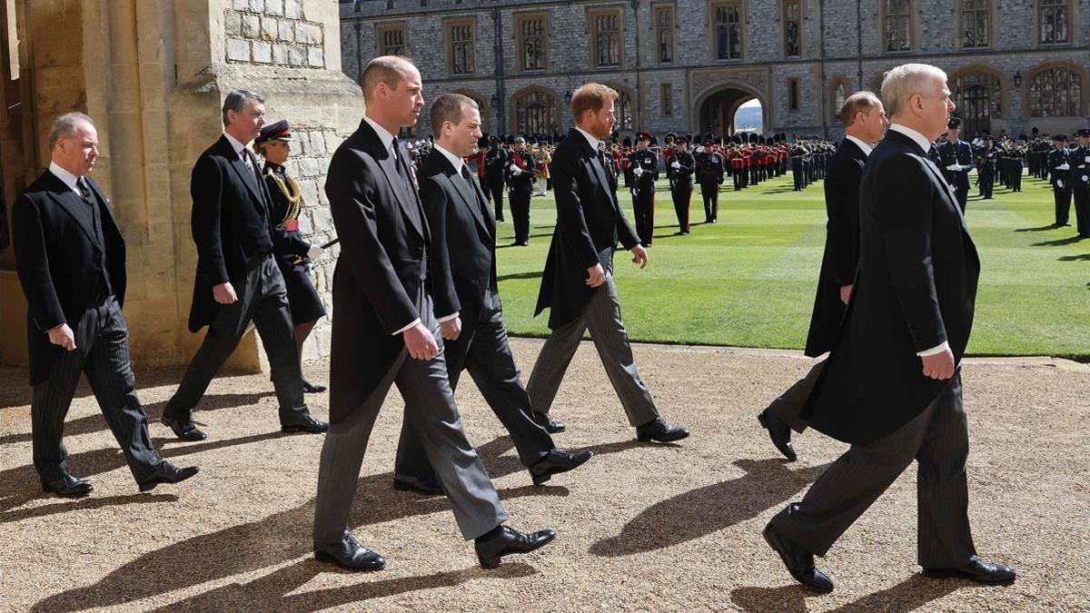 Britain s Prince Andrew  Duke of York (from R)  Britain s Prince Edward  Earl of Wessex  Britain s Prince William  Duke of Cambridge  Peter Phillips  Britain s Prince Harry  Duke of Sussex  Britain s Earl of Snowdon and Vice Admiral Timothy Laurence march behind the coffin during the funeral ceremony for Britain s Prince Philip  Duke of Edinburgh at St George s Chapel in Windsor Castle in Windsor  west of London  on April 17  2021  - Philip  who was married to Queen Elizabeth II for 73 years  died on April 9 aged 99 just weeks after a month-long stay in hospital for treatment to a heart condition and an infection  (Photo by CHRIS JACKSON   various sources   AFP)