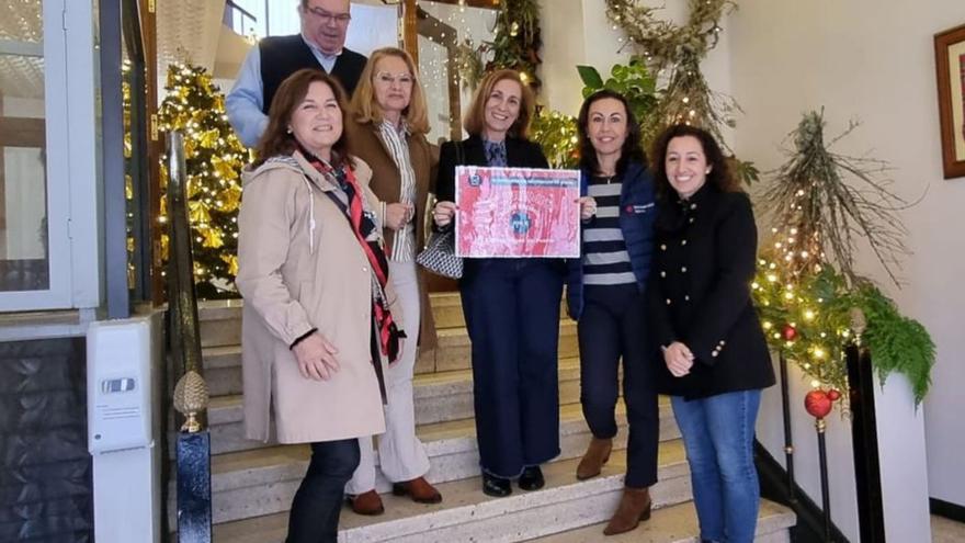 Entrega de uno de los premios de la decoración navideña.