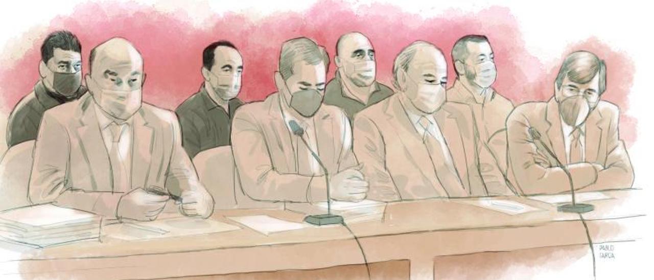 Delante, los abogados Fernando Barutell, Adrián Fernández, Luis Mendiguren y Javier Beramendi. Detrás, los acusados: Maamar Kelii, Djillali Benatia, Jesús Muguruza y Pedro Luis Nieva.