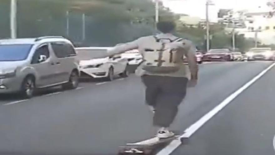 SKATEBOARD RECKLESS VIDEO CANARY ISLANDS: On a skateboard and going crazy on a road in the Canary Islands
