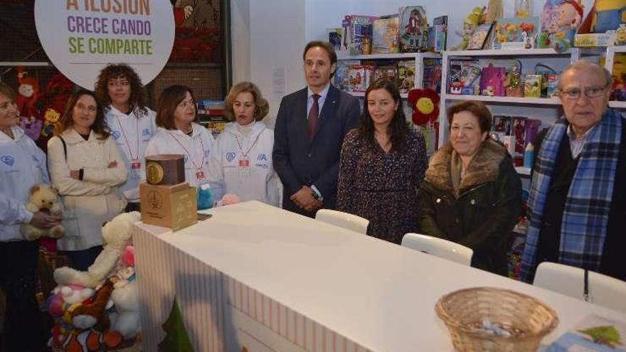 Representantes de Abanca y Cáritas, ayer.