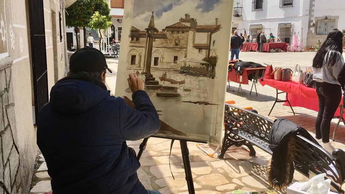 Antonio Pineda pintando el cuadro premiado en Valdefuentes.