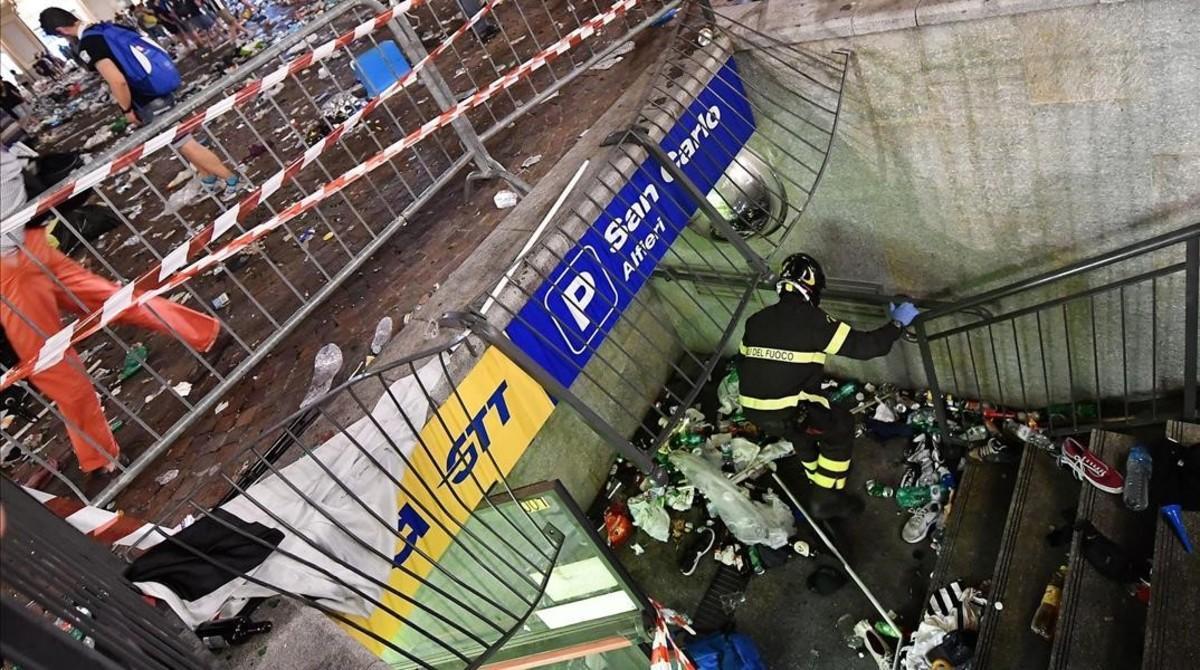 ecarrasco38733554 an italian firefighter inspects a collapsed fence as juventu170604190607