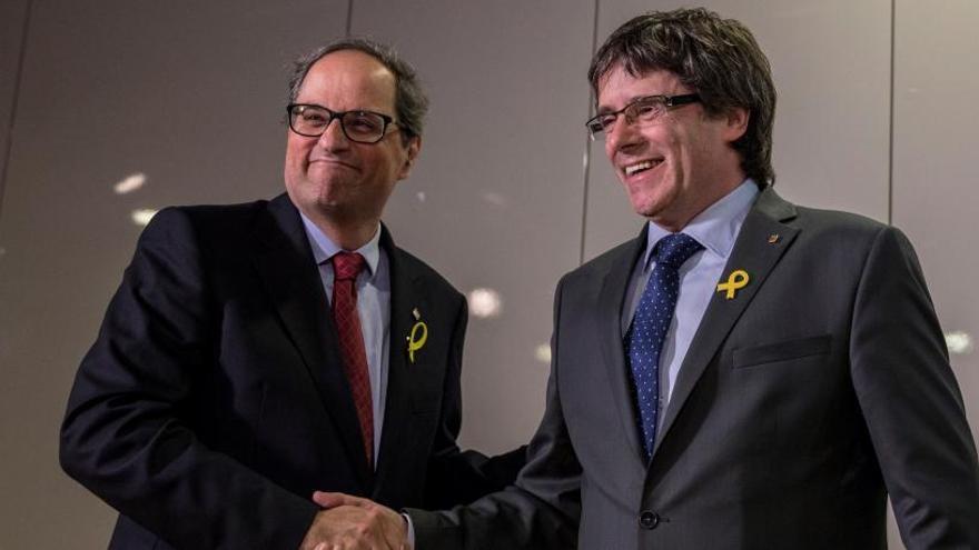 Quim Torra, junto a Carles Puigdemont