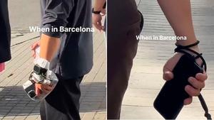 Turistas con móviles atados a la muñeca, en Barcelona