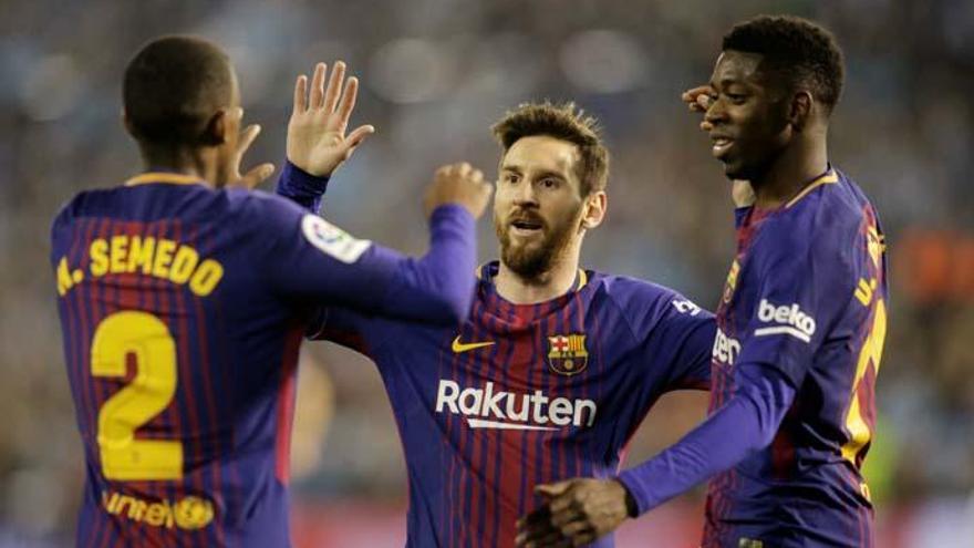 Messi celebra un gol junto a Semedo y Dembélé.