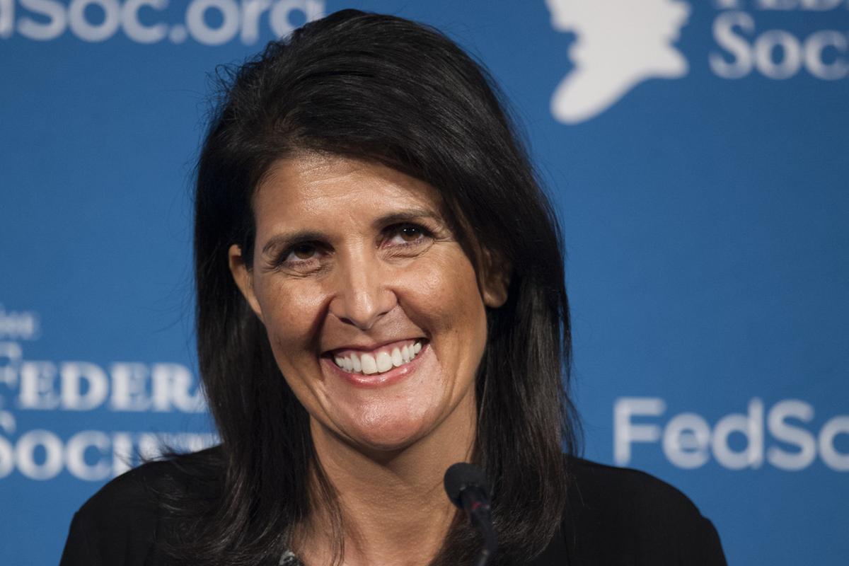 FILE - In this Friday, Nov. 18, 2016 photo, South Carolina Gov. Nikki Haley smiles while speaking at the Federalist Society’s National Lawyers Convention in Washington. President-elect Donald Trump has chosen Haley as U.S. ambassador to the United Nations, and he will treat the ambassadorship as a Cabinet-level position, according to two sources familiar with Trump’s decision who requested anonymity to discuss the decision and its announcement. Haley, an outspoken Trump critic throughout much of the presidential race, would become his first female - and first nonwhite - Cabinet-level official if confirmed by the Senate. (AP Photo/Cliff Owen, File) FILE - In this Friday, Nov. 18, 2016 photo, South Carolina Gov. Nikki Haley smiles while speaking at the Federalist Society’s National Lawyers Convention in Washington. President-elect Donald Trump has chosen Haley as U.S. ambassador to the United Nations, and he will treat the ambassadorship as a Cabinet-level position, according to two sources familiar with Trump’s decision who requested anonymity to discuss the decision and its announcement. Haley, an outspoken Trump critic throughout much of the presidential race, would become his first female - and first nonwhite - Cabinet-level official if confirmed by the Senate. (AP Photo/Cliff Owen, File)