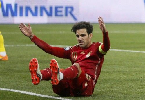 Spain's Fabregas appeals for a penalty after being fouled during the Euro 2016 group C qualifying soccer match against Ukraine at the Olympic stadium in Kiev