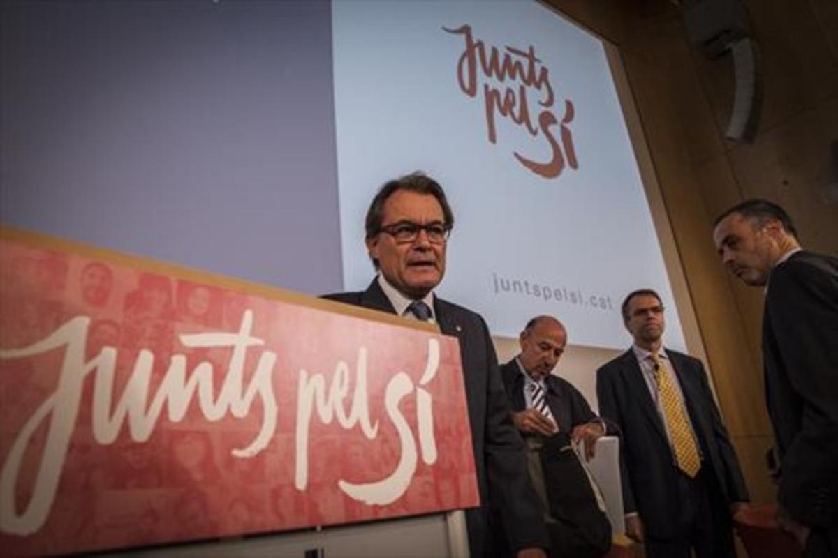 Artur Mas, ahir, amb Germà Bel i Oriol Amat, en un acte de Junts pel Sí.