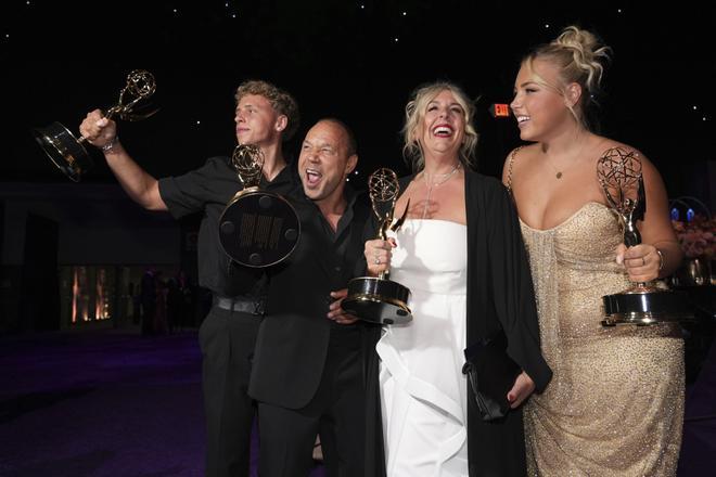 Alfie Graham, from left, Stephen Graham, Hannah Walters, and Grace Graham, with the awards for outstanding writing for a limited or anthology series for Adolescence, outstandng lead actor in a limited or anthology series for Adolescence and for outstanding limited or anthology series for Adolescence, attend the Governors Ball for the 77th Primetime Emmy Awards on Sunday, Sept. 14, 2025, at the Los Angeles Convention Center in Los Angeles. (AP Photo/Chris Pizzello). 091425132020, 21334631,
