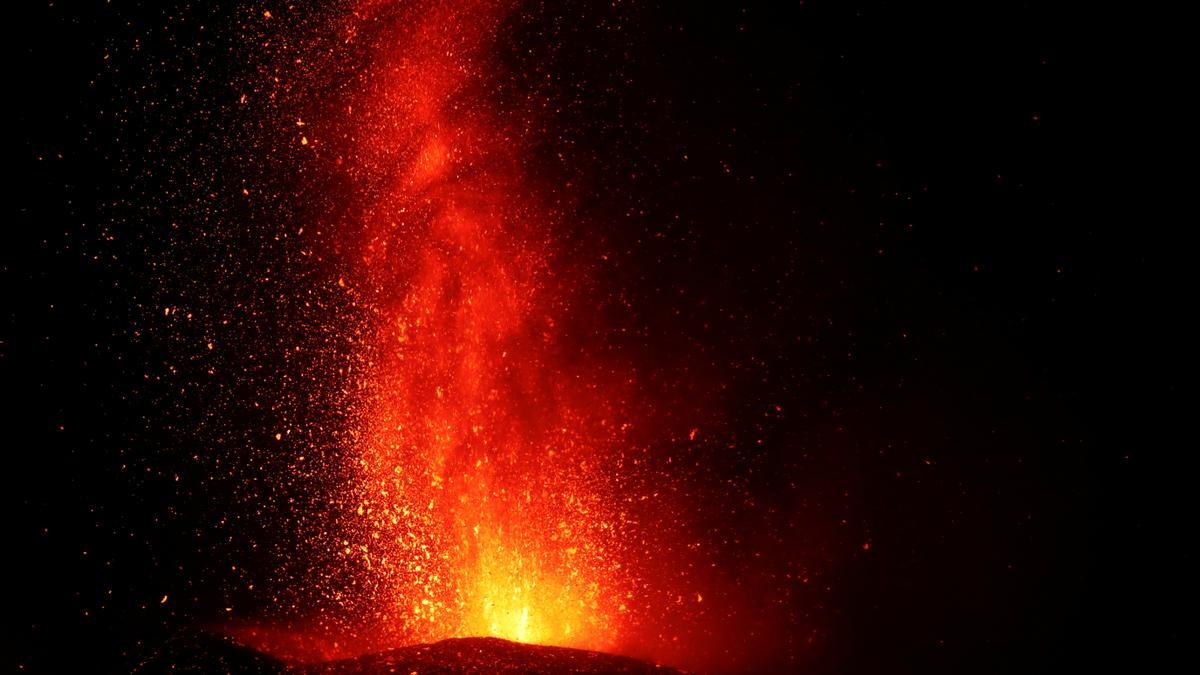 Lava and smoke rise following the eruption of a volcano on Spanish Canary Island of La Palma