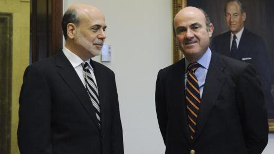 Luis de Guindos (d), con Ben Bernanke.