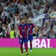 Araujo y Gündogan, cabizbajos en el Clásico del Bernabéu tras el gol de Bellingham