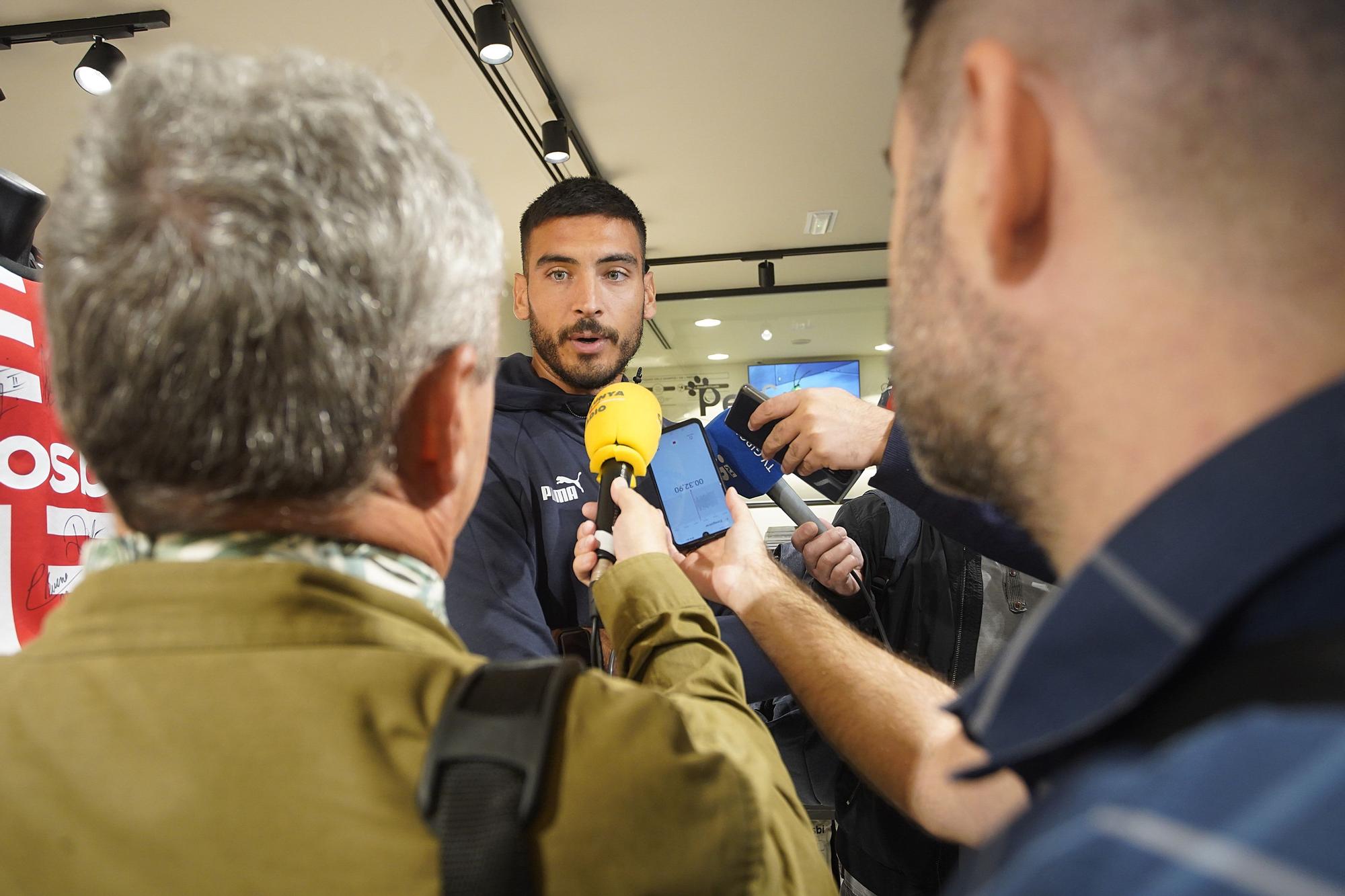 Comunió entre jugadors i aficionats a la nova botiga Gosbi de Girona