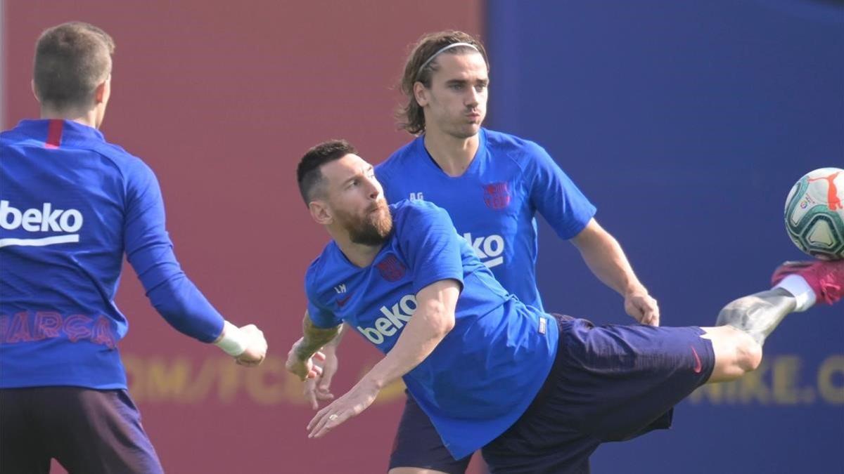Messi y Griezmann, en el entrenamiento previo al duelo con el Villarreal.