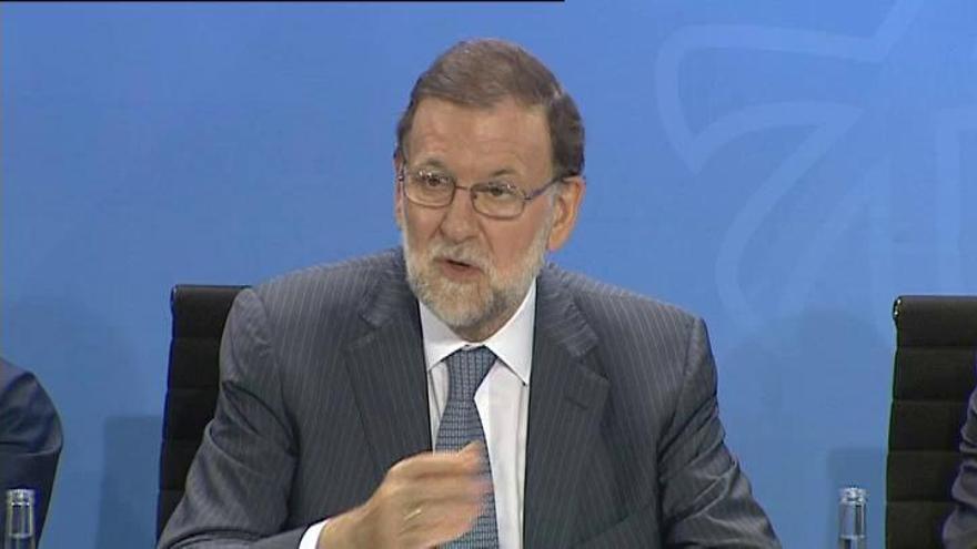 Rajoy pide en Berlín "claridad contra el proteccionismo"