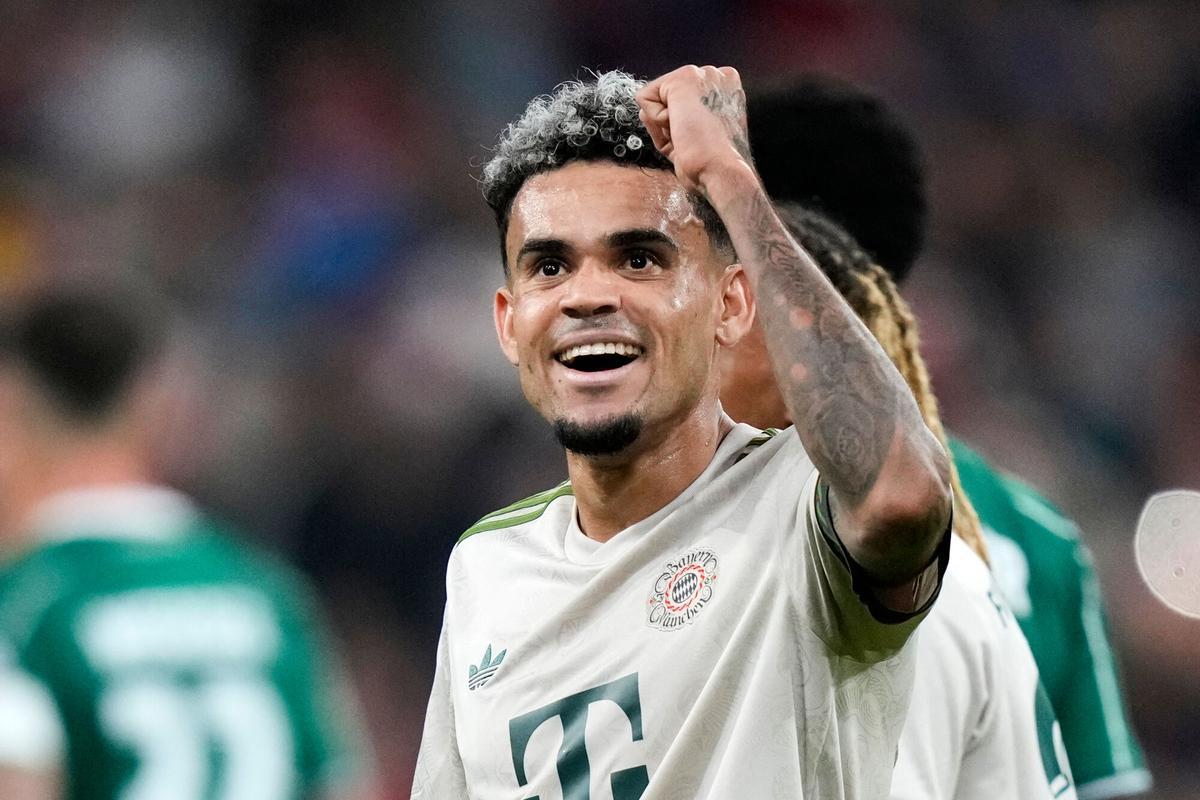 Bayern's Luis Diaz celebrates after scoring his side's opening goal during the Bundesliga soccer match between Bayern Munich and Werder Bremen at the Allianz Arena in Munich, Germany, Friday, Sept. 26, 2025. (AP Photo/Matthias Schrader)