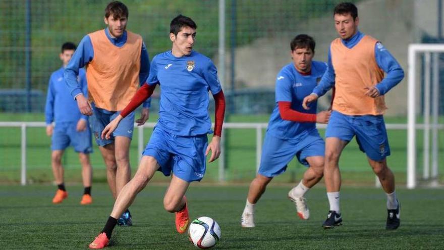 Bruno, Anxo, Mouriño y Kevin Presa, durante un entrenamiento. // G. Santos