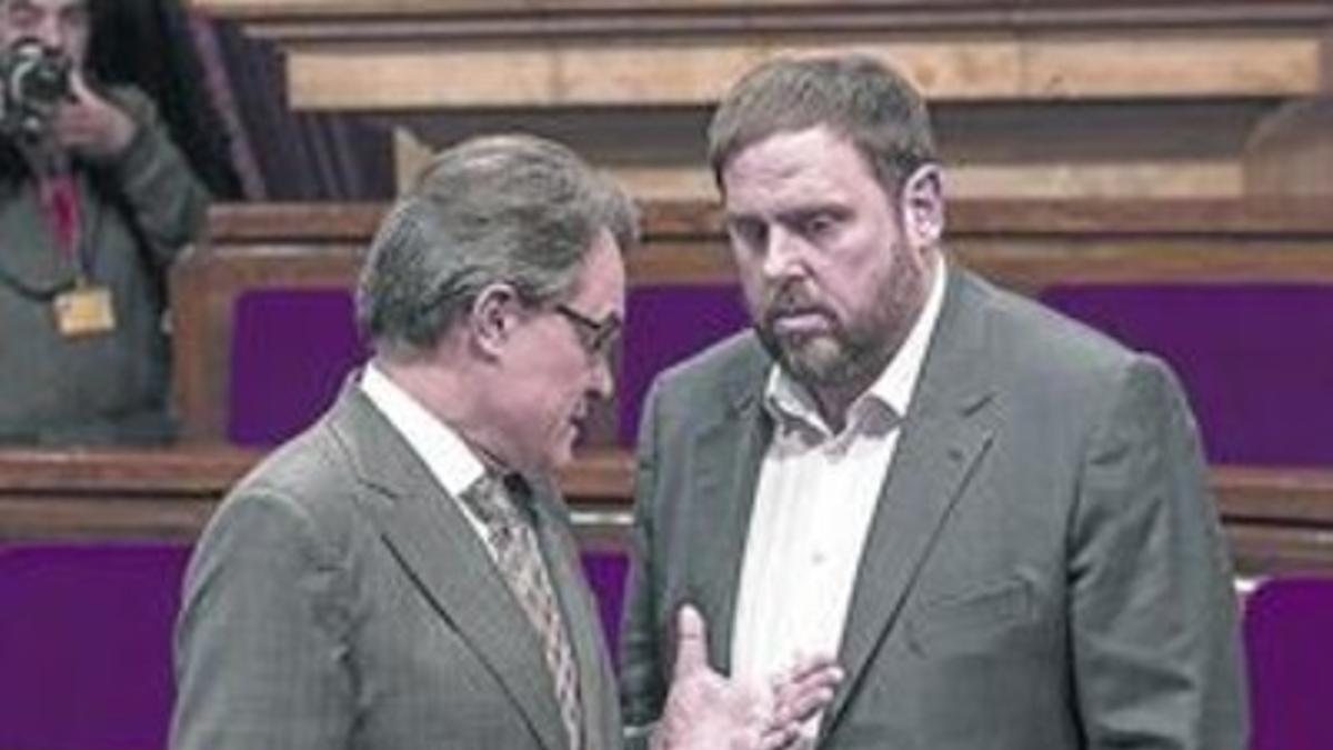 Cara a cara. Mas y Junqueras, en el Parlament, el pasado enero.