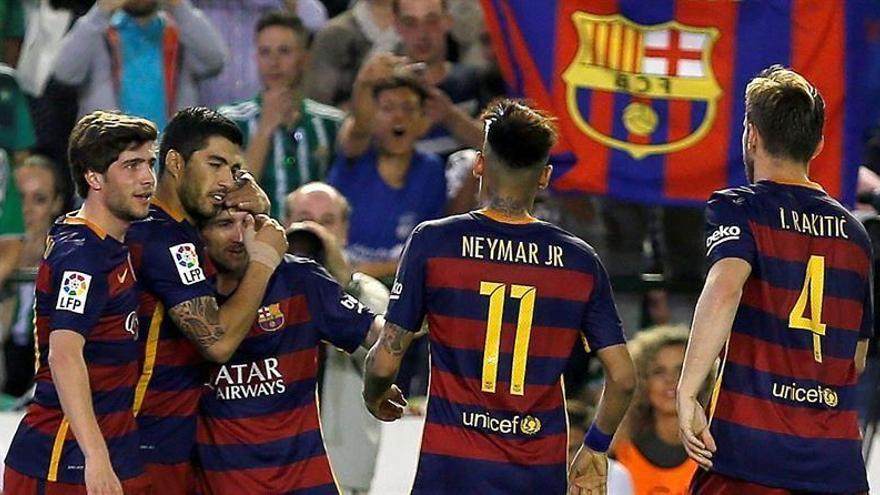 El Barcelona se mantiene líder en Sevilla (0-2)