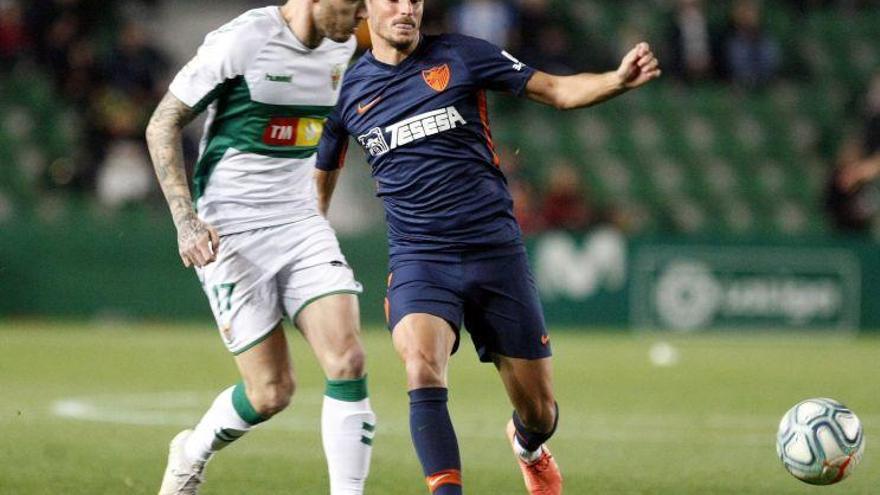 Juankar pugna por un balón en el partido de este pasado sábado en el Martínez Valero frente al Elche.