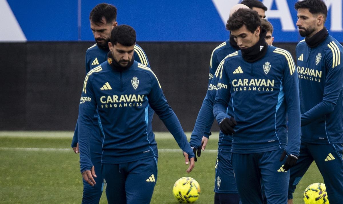 Juan Sebastián, con Pomares en un entrenamiento.