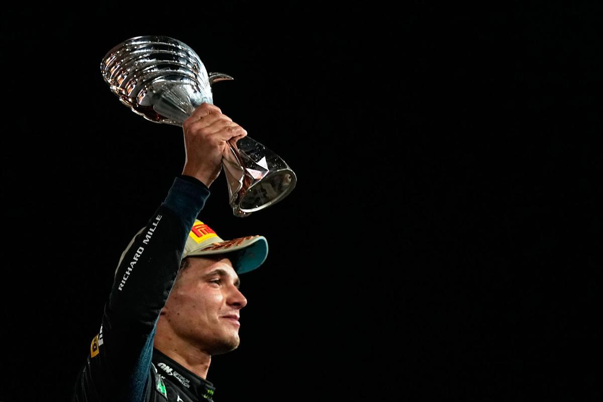 McLaren driver Lando Norris of Britain celebrates after becoming a world champion after the Formula One Abu Dhabi Grand Prix at the Yas Marina Circuit in Abu Dhabi, UAE, Sunday, Dec. 7, 2025. (AP Photo/Fatima Shbair). EDITORIAL USE ONLY / ONLY ITALY AND SPAIN