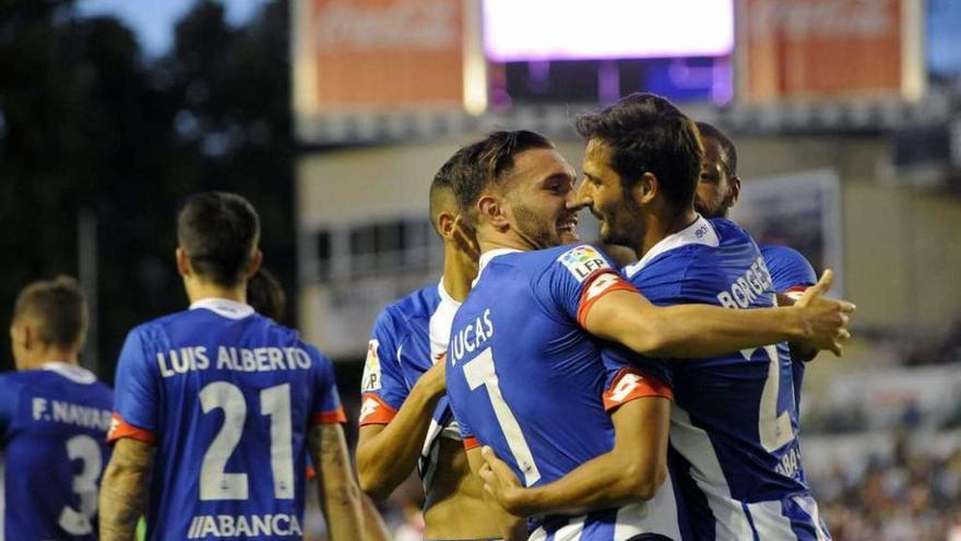 Lucas y Borges celebran uno de los goles del equipo ante el Rayo en presencia de Fayçal y Sidnei.