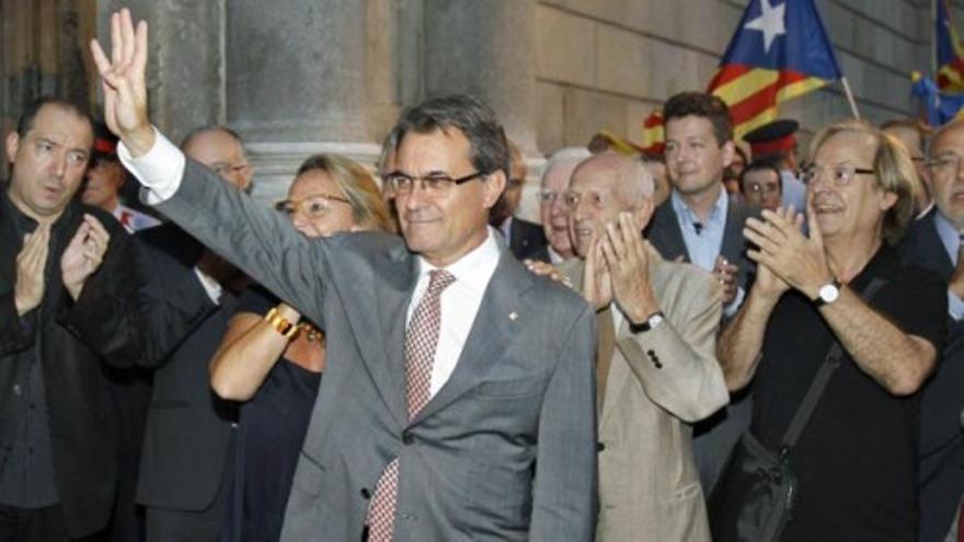 Artur Mas, aclamado a su llegada a la Generalitat