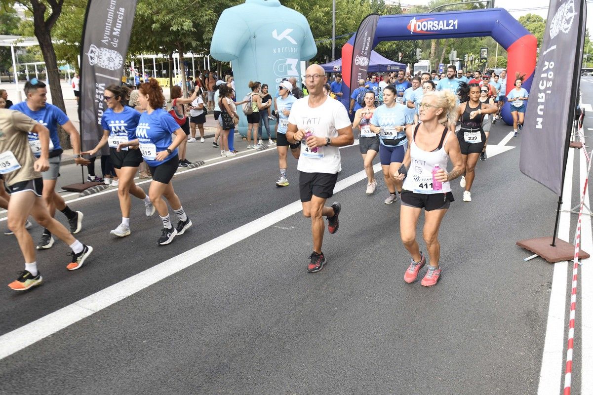 La carrera y marcha Solidaria Asteamur, en imágenes
