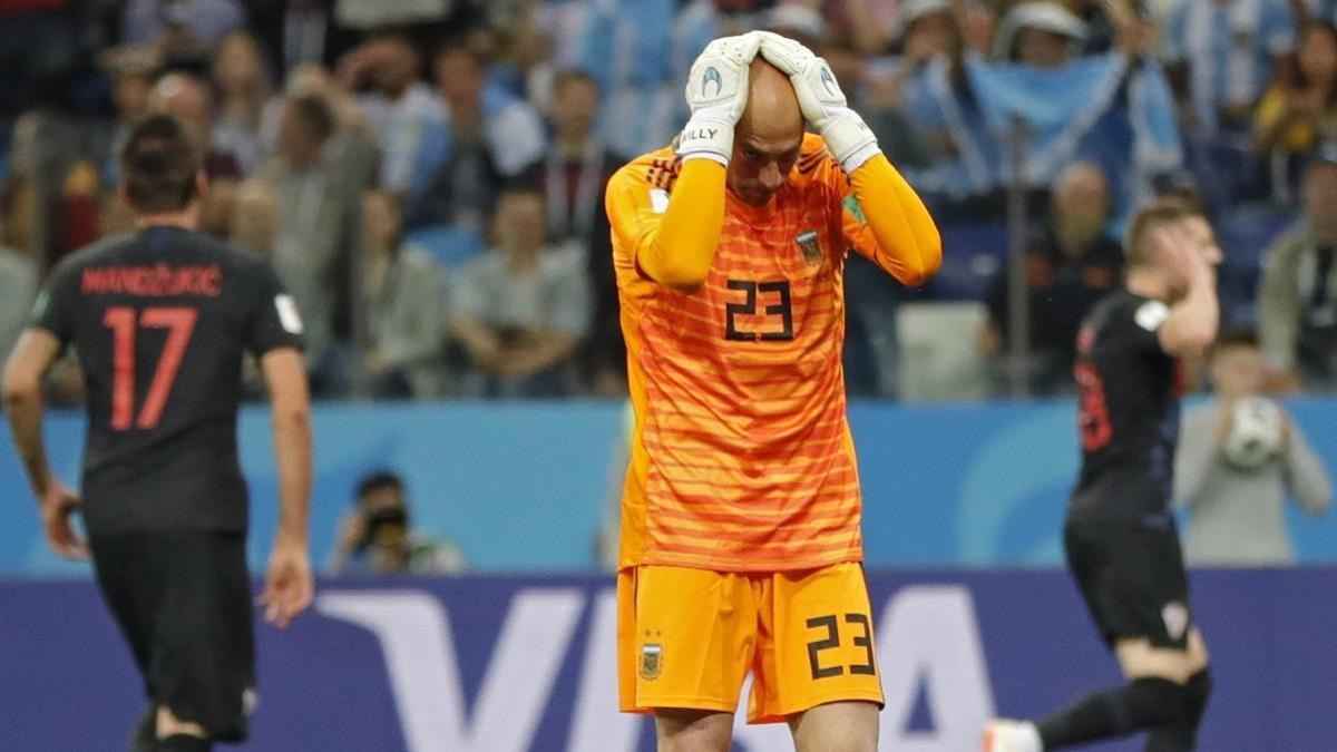 rpaniagua43892738 argentina goalkeeper wilfredo caballero holds his head after180621225724