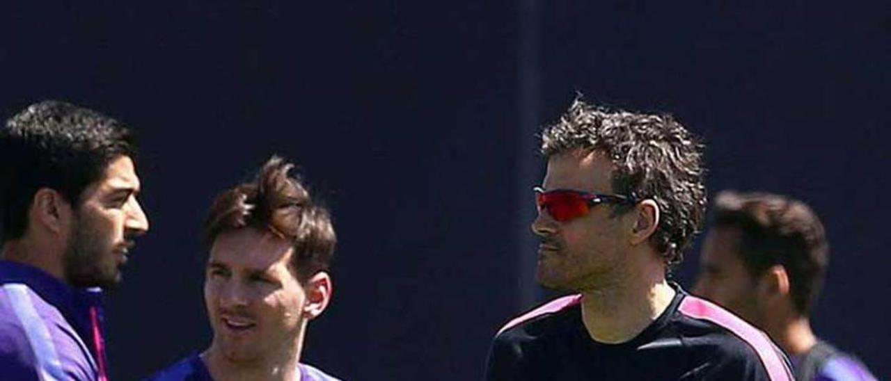 Luis Enrique y Messi, en un entrenamiento.