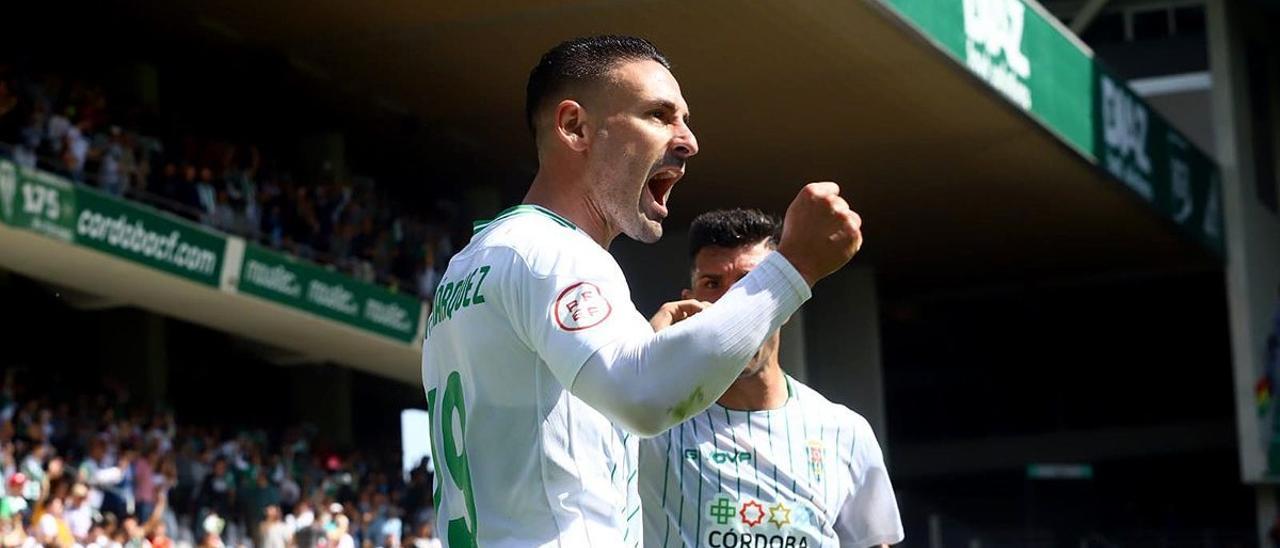 Kike Márquez, junto a Willy Ledesma, celebrando su gol en el pasado ante el Ceuta.