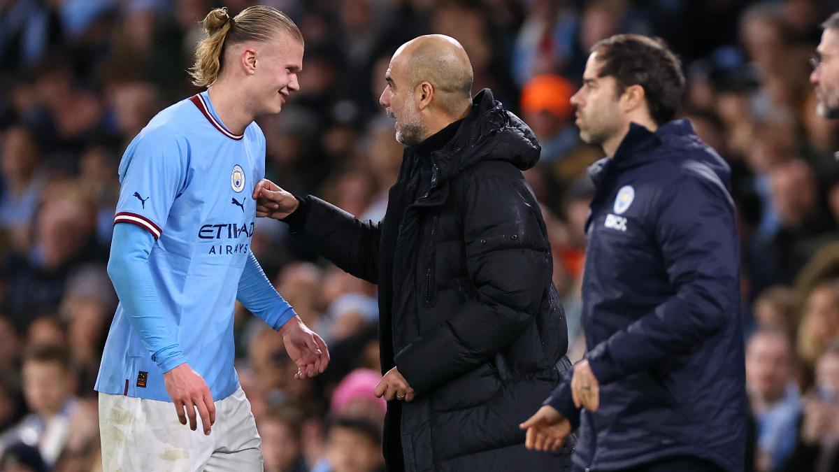 Erling Haaland junto a Pep Guardiola