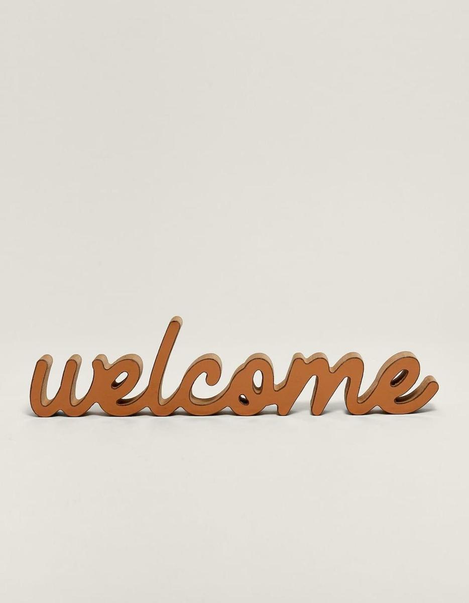 Cartel de 'Welcome' de Stradivarius. (Precio: 7, 99 euros)