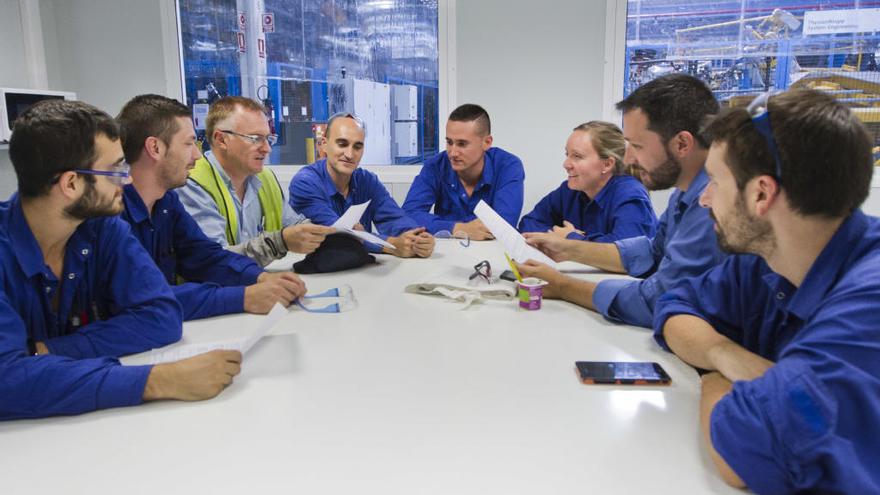 Trabajadores de Ford en una reunión de formación.