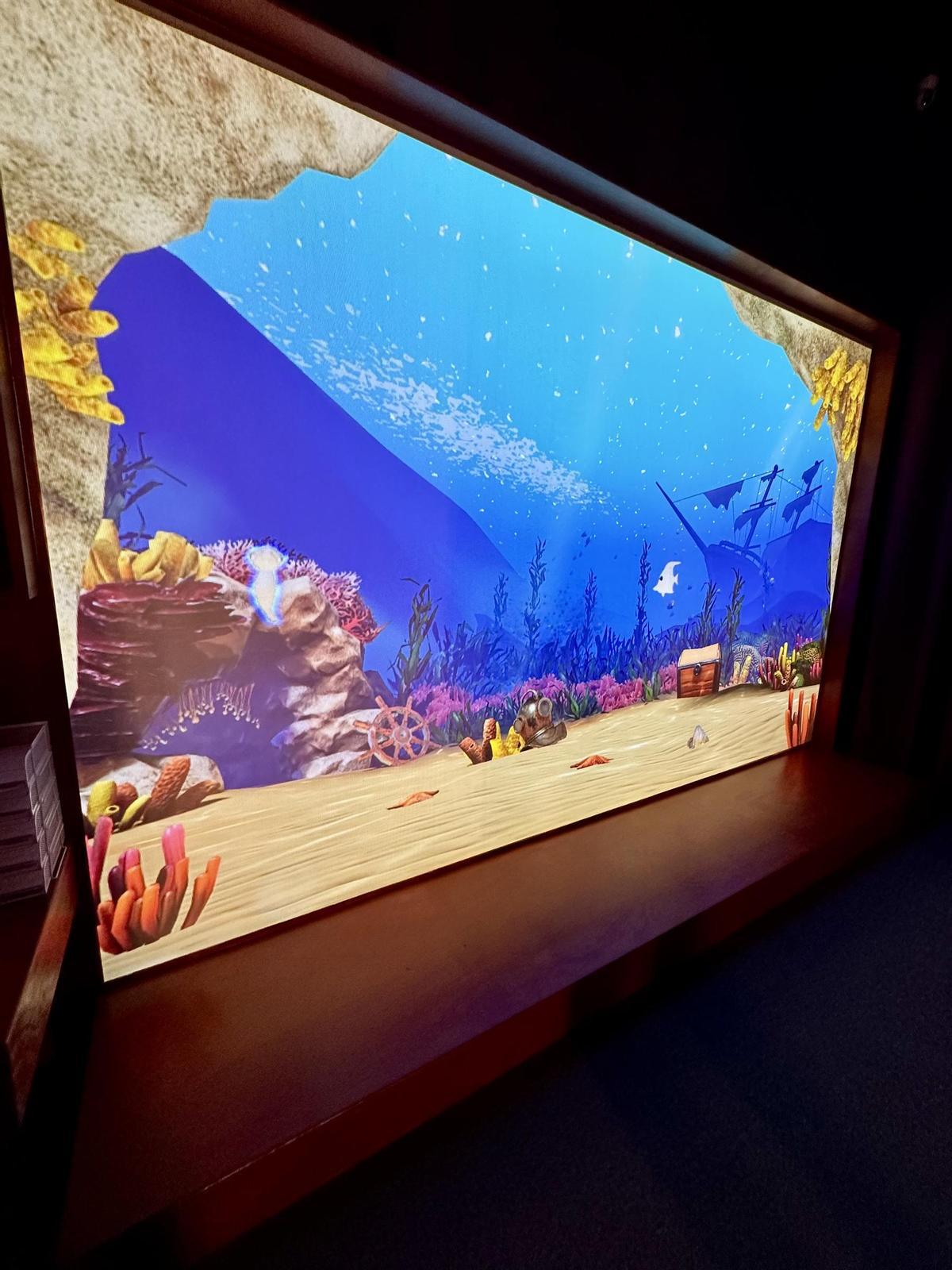 Den zuvor ausgemalten Fisch schwimmen sehen.