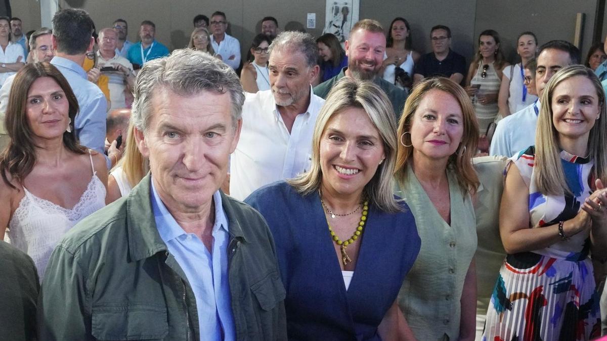 Núñez Feijóo, junto a Barrachina y Carrasco, en el foro en Castelló.