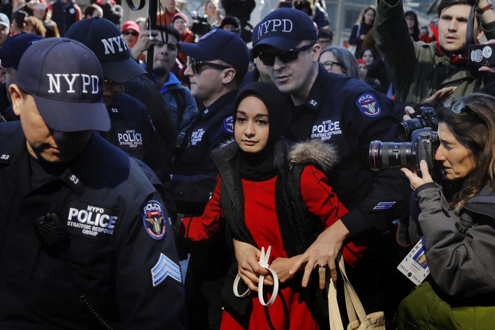 New York Police Department officers arrest a ...