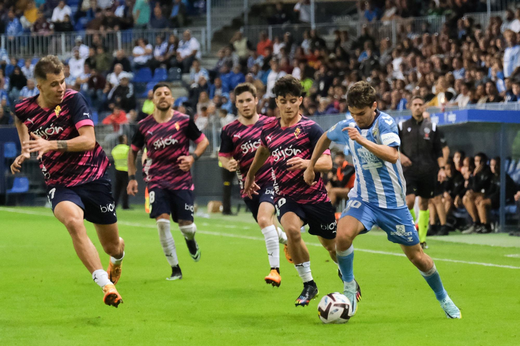 El Málaga CF - Sporting de Gijón, en imágenes