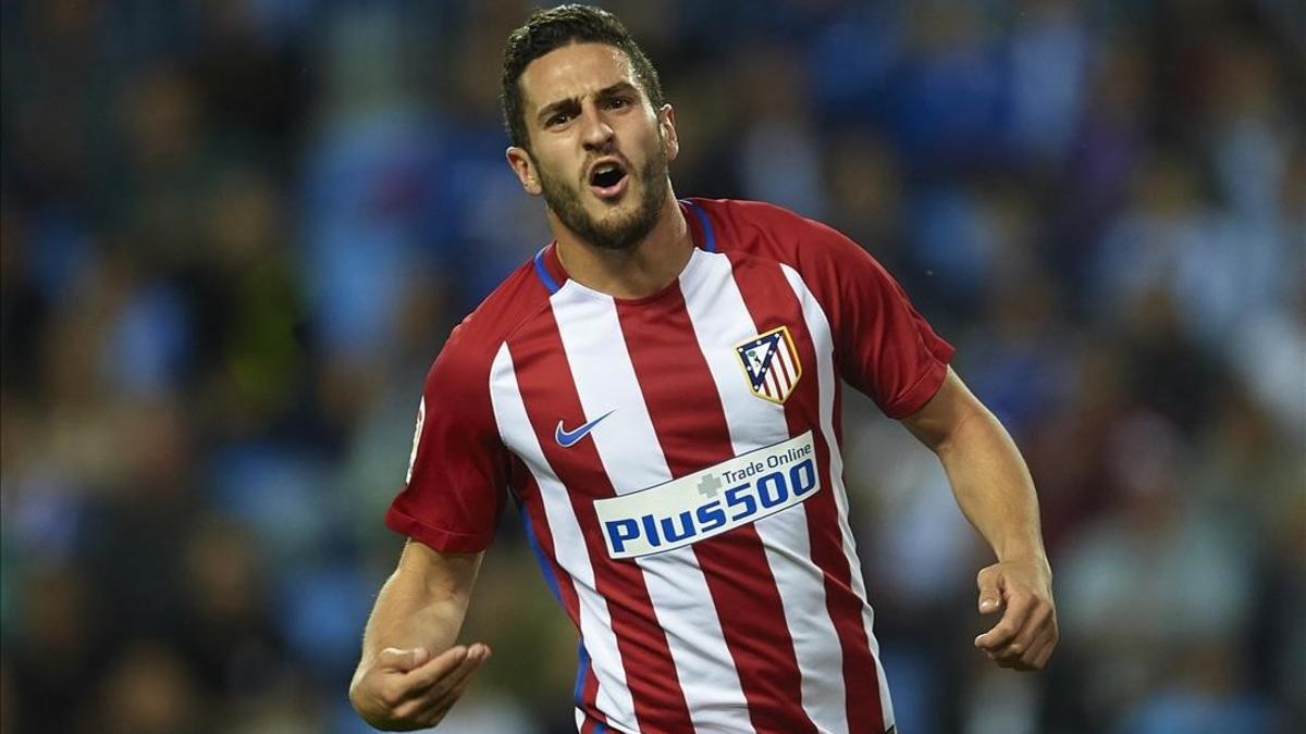 Koke Resurrección celebra un gol contra el Málaga