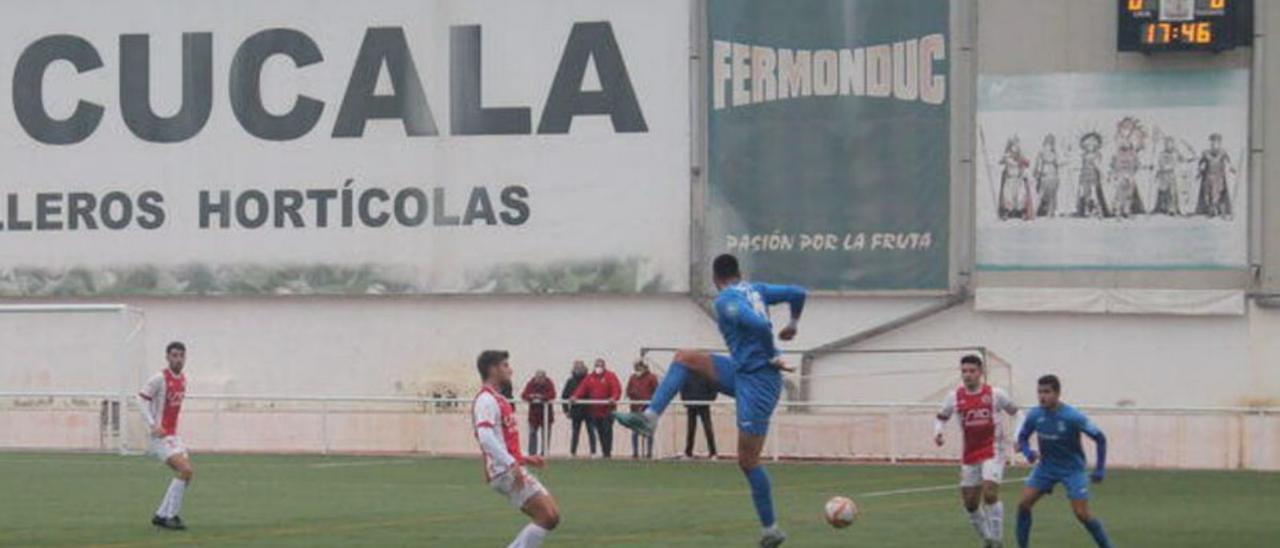 Un lance del partido entre el Benigànim y el Olímpic. | UD BENIGÀNIM