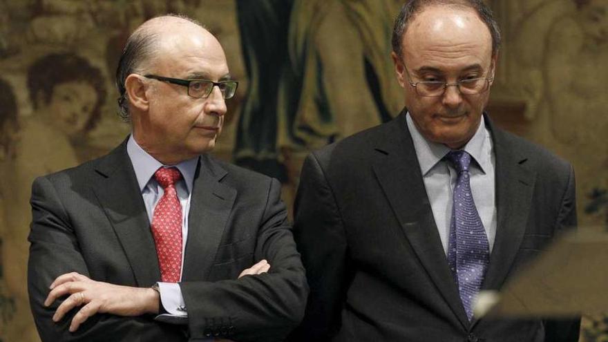 Cristóbal Montoro y el gobernador del Banco de España, Luis María Linde.